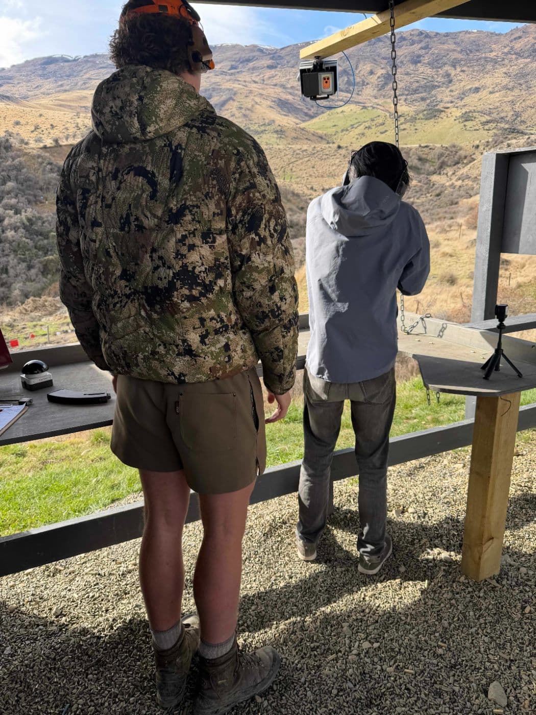 Range officer and guest at the lane
